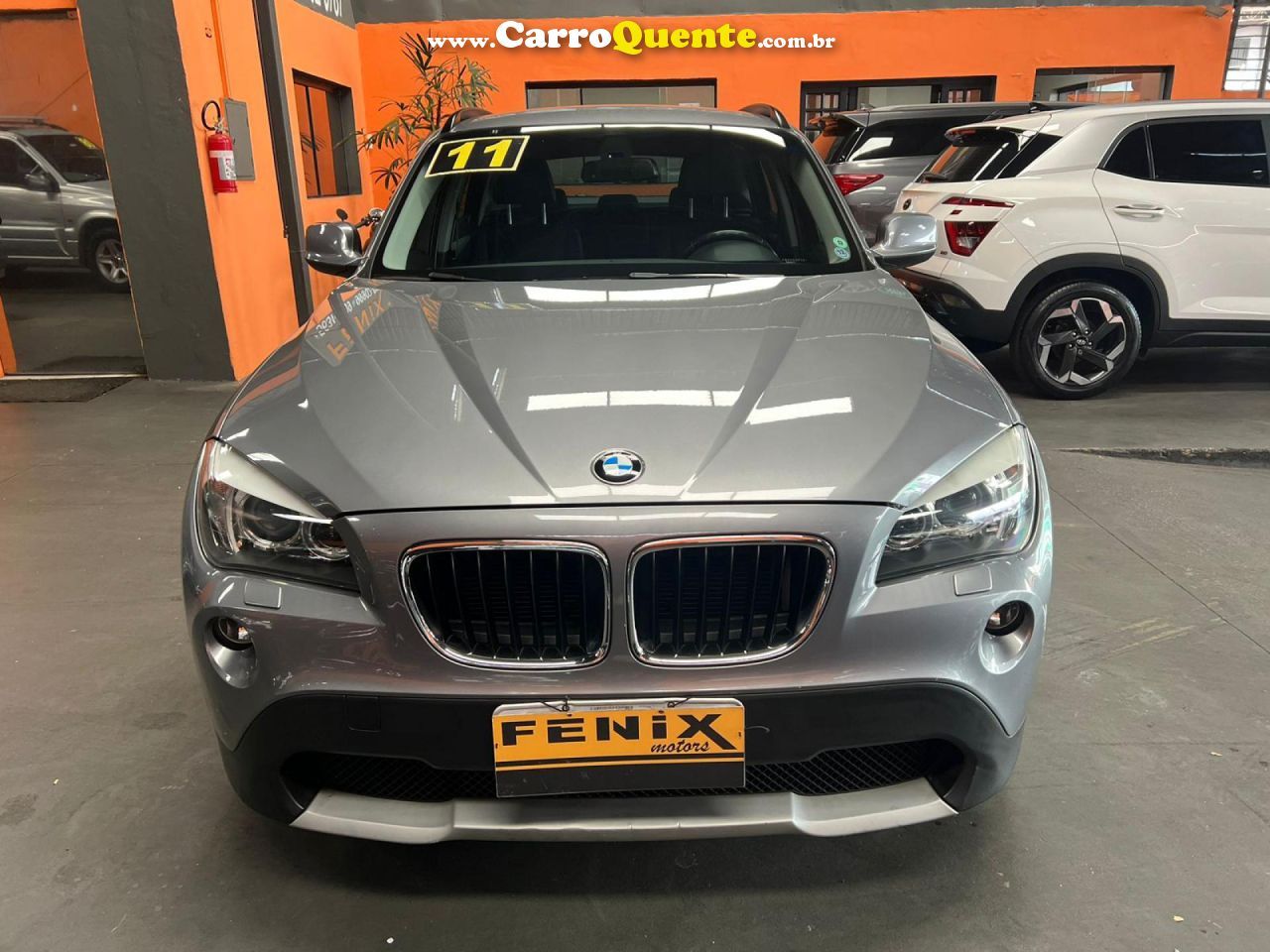 BMW   X1 SDRIVE 18I 2.0 16V 4X2 AUT.   CINZA 2011 2.0 GASOLINA - Loja