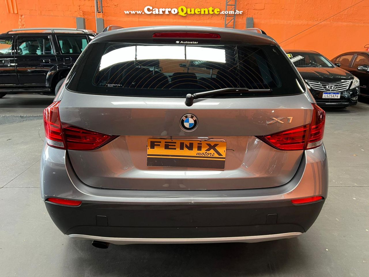 BMW   X1 SDRIVE 18I 2.0 16V 4X2 AUT.   CINZA 2011 2.0 GASOLINA - Loja