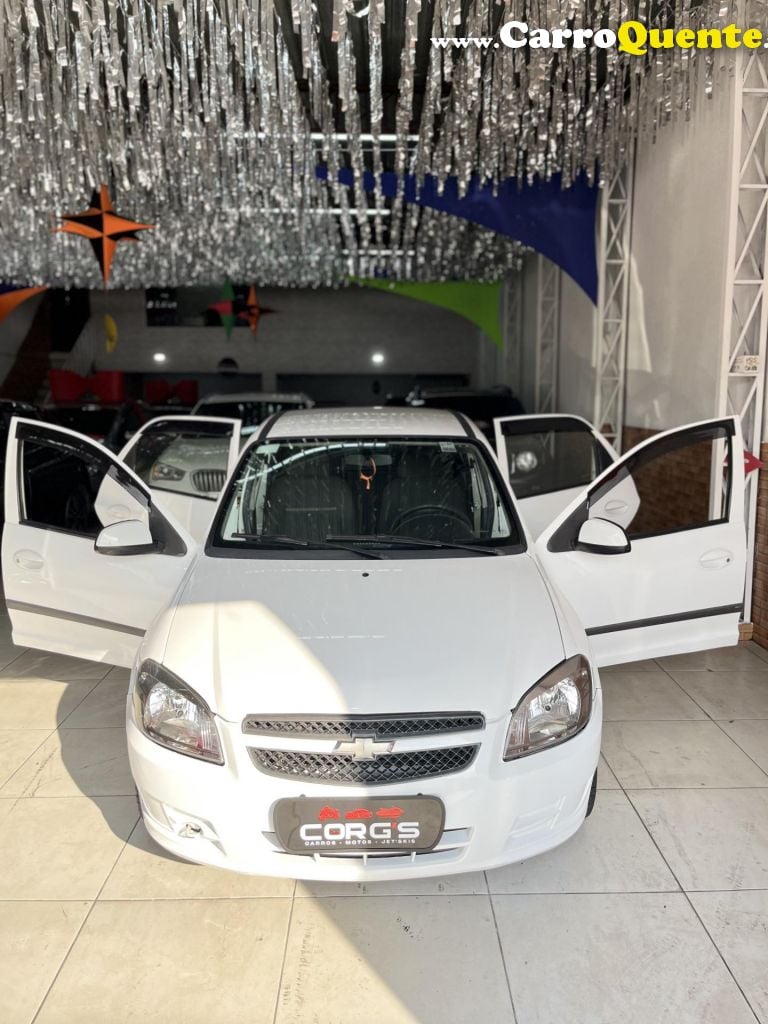 CHEVROLET   CELTA SPIRIT LT 1.0 MPFI 8V FLEXP. 5P   BRANCO 2013 1.0 FLEX - Loja