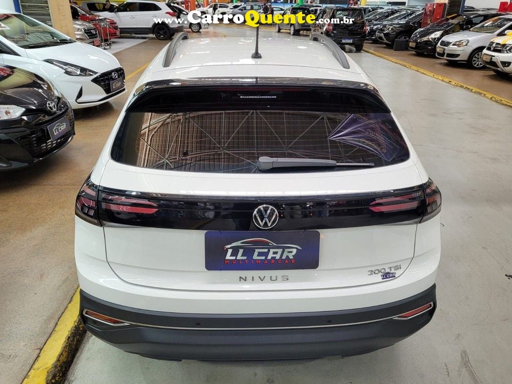 VOLKSWAGEN NIVUS 1.0 200 TSI  AUTOMATICO + BAIXO KM - Loja