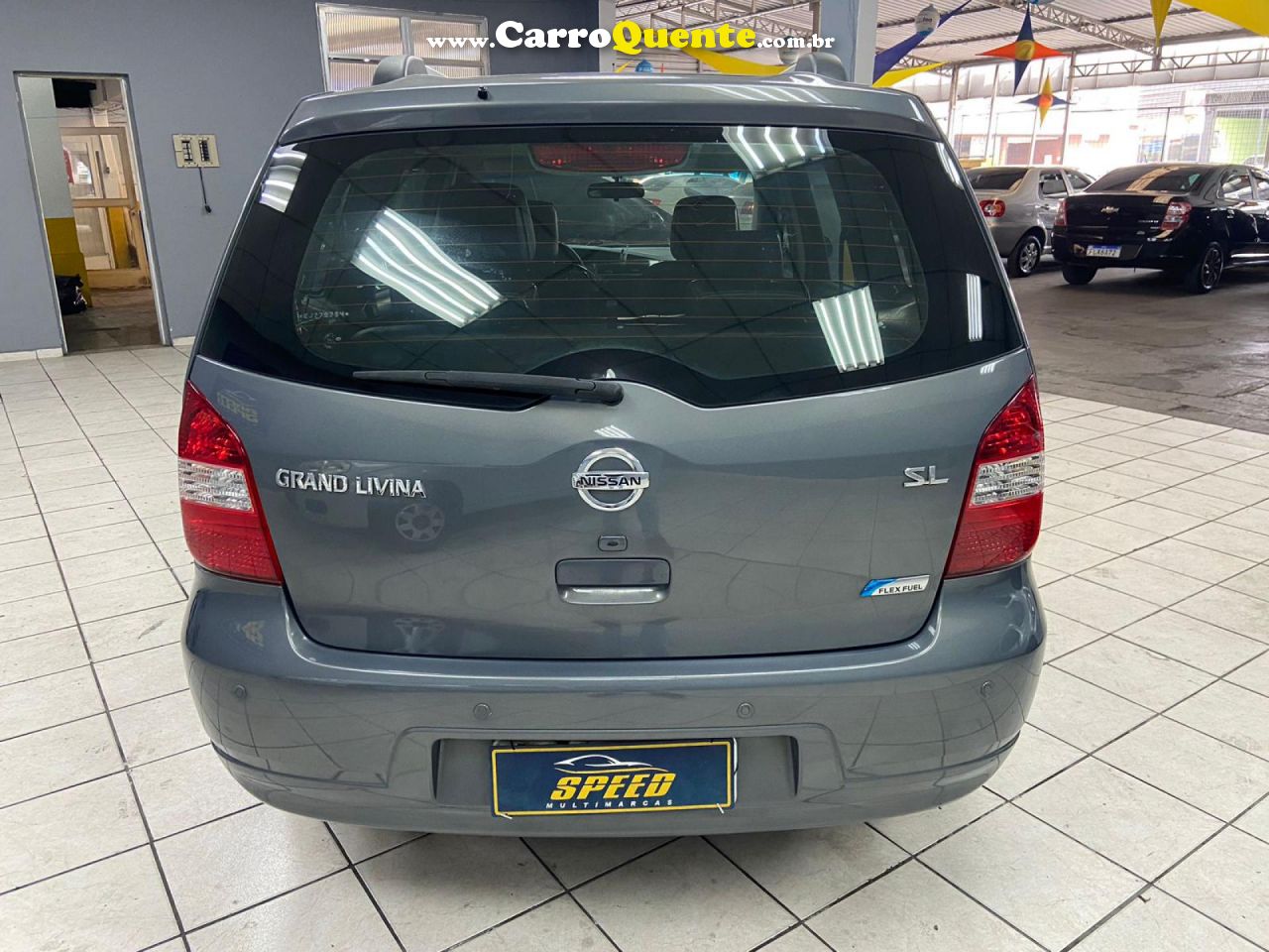 NISSAN   LIVINA GRAND SL 1.8 16V FLEX FUEL AUT.   CINZA 2014 1.8 FLEX - Loja