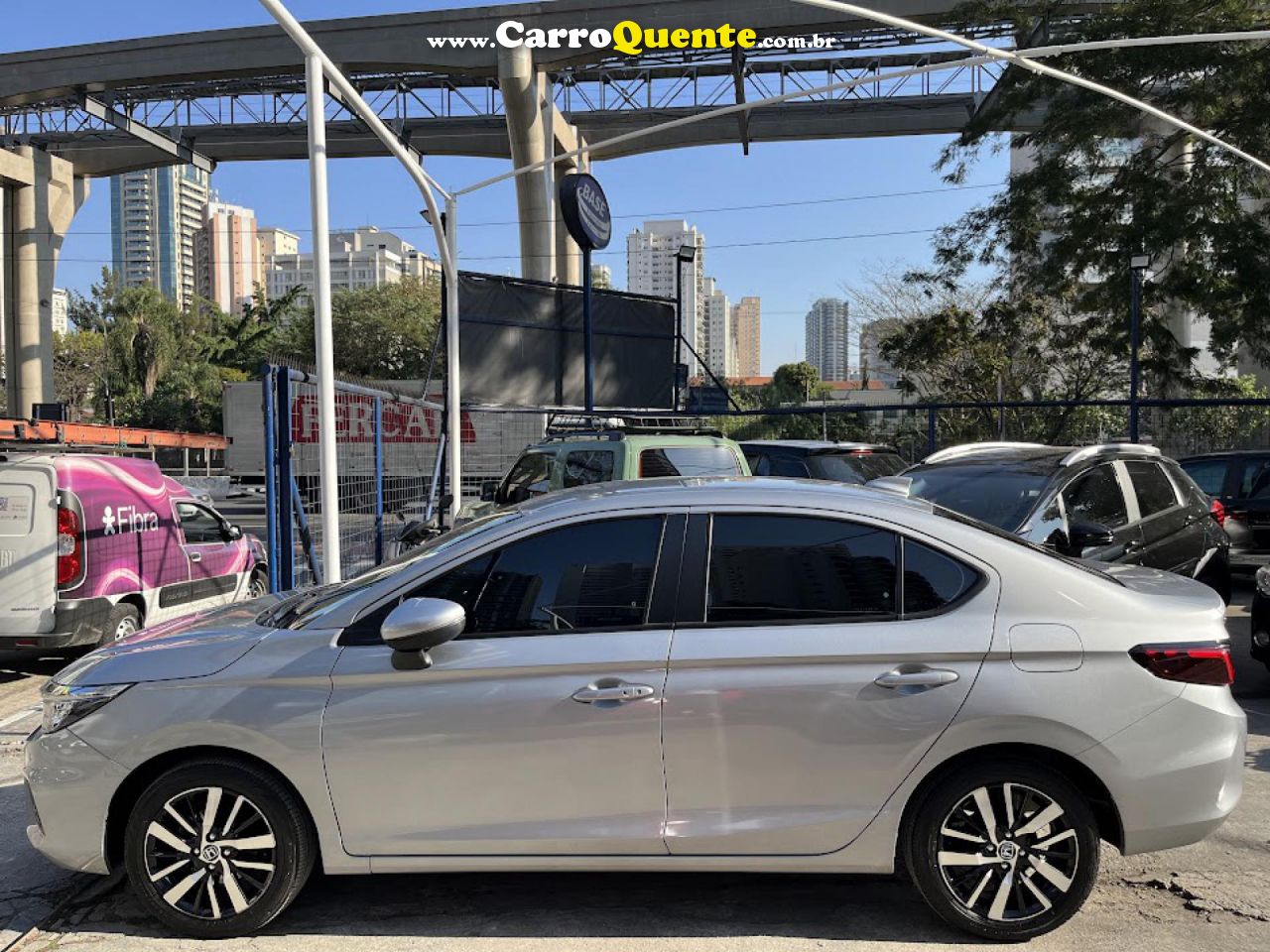 HONDA   CITY SEDAN TOURING 1.5 FLEX 16V 4P AUT.   PRATA 2022 1.5 FLEX - Loja