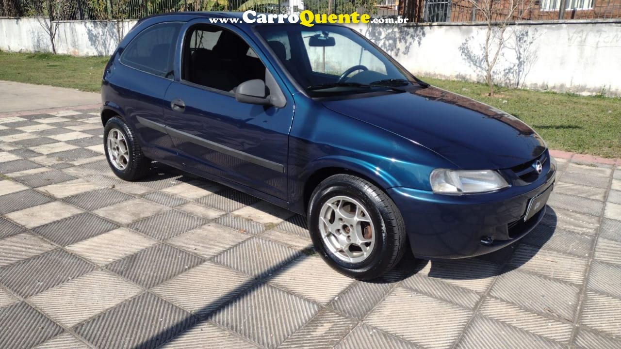 CHEVROLET   CELTA 1.0SUPERN.PIQ.1.0 MPFI VHC 8V 3P   AZUL 2003 1.0 GASOLINA - Loja