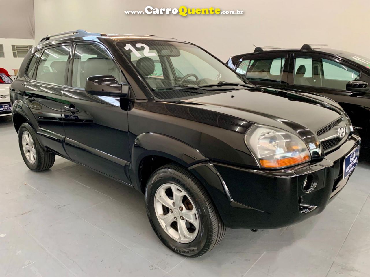 HYUNDAI   TUCSON 2.0 16V AUT.   PRETO 2012 2.0 GASOLINA - Loja