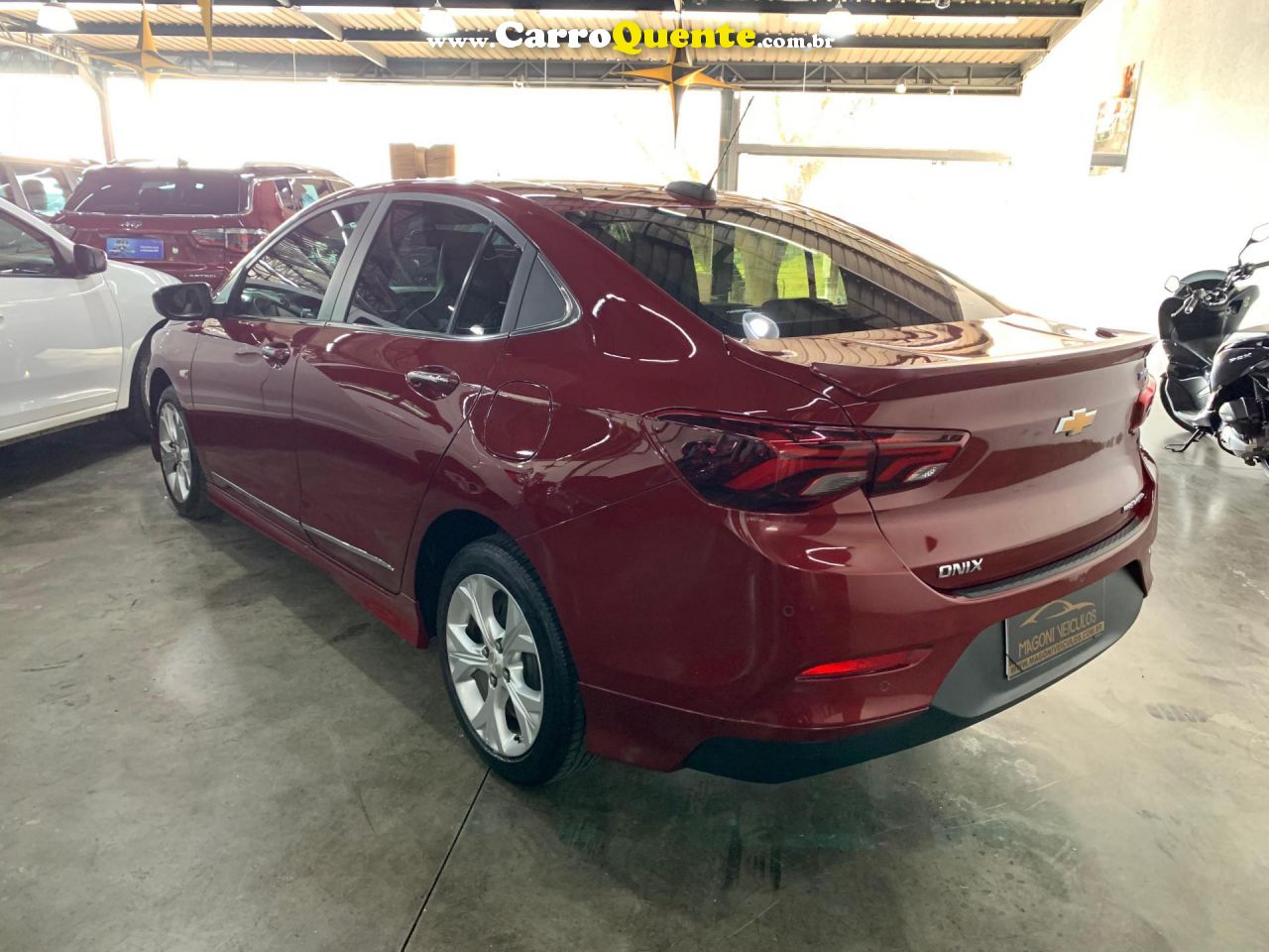 CHEVROLET   ONIX SED. PLUS PREM. 1.0 12V TB FLEX AUT   VERMELHO 2020 1.0 FLEX - Loja