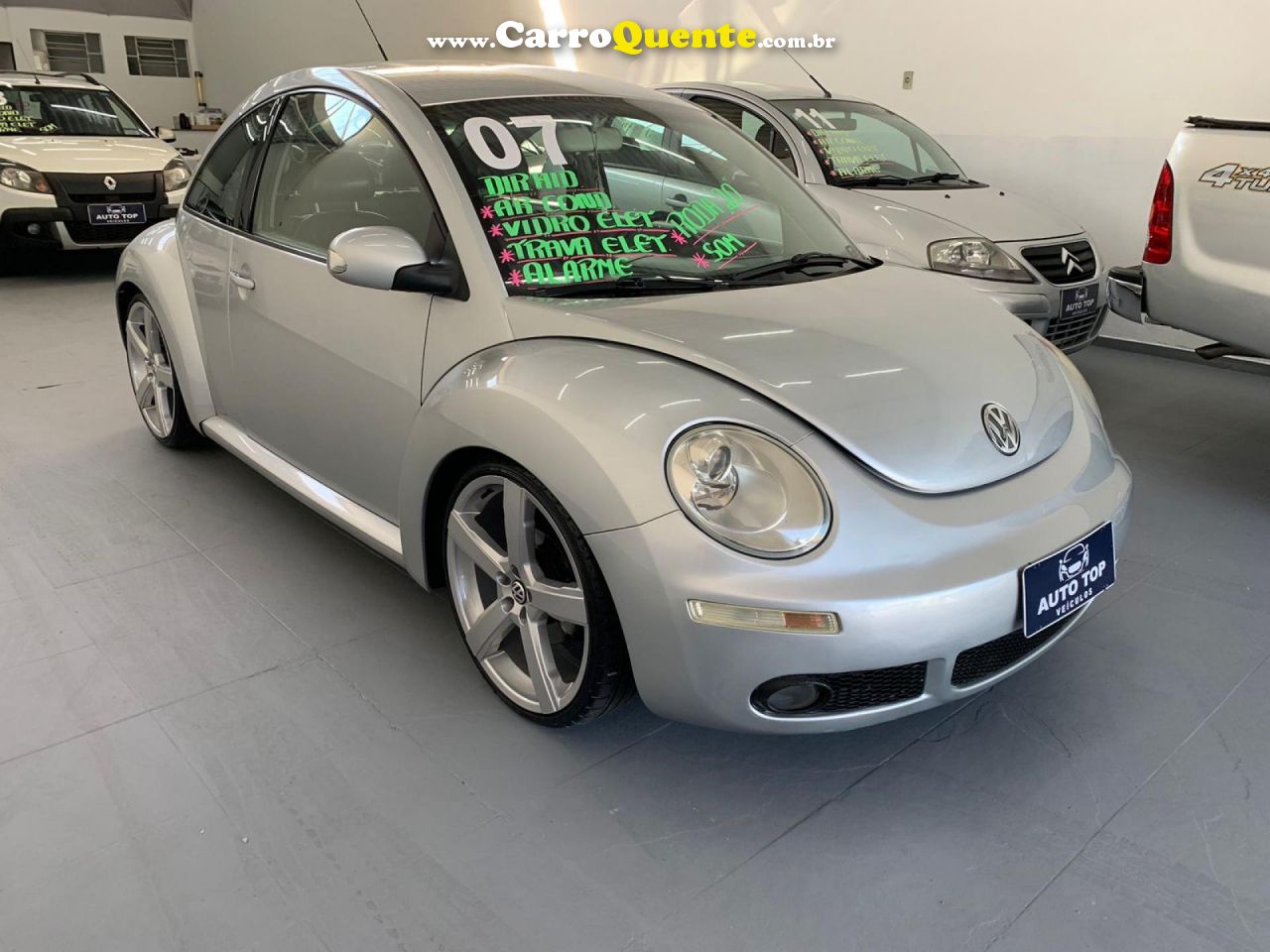 VOLKSWAGEN   NEW BEETLE 2.0 MI MEC.AUT.   PRATA 2007 2.0 GASOLINA - Loja