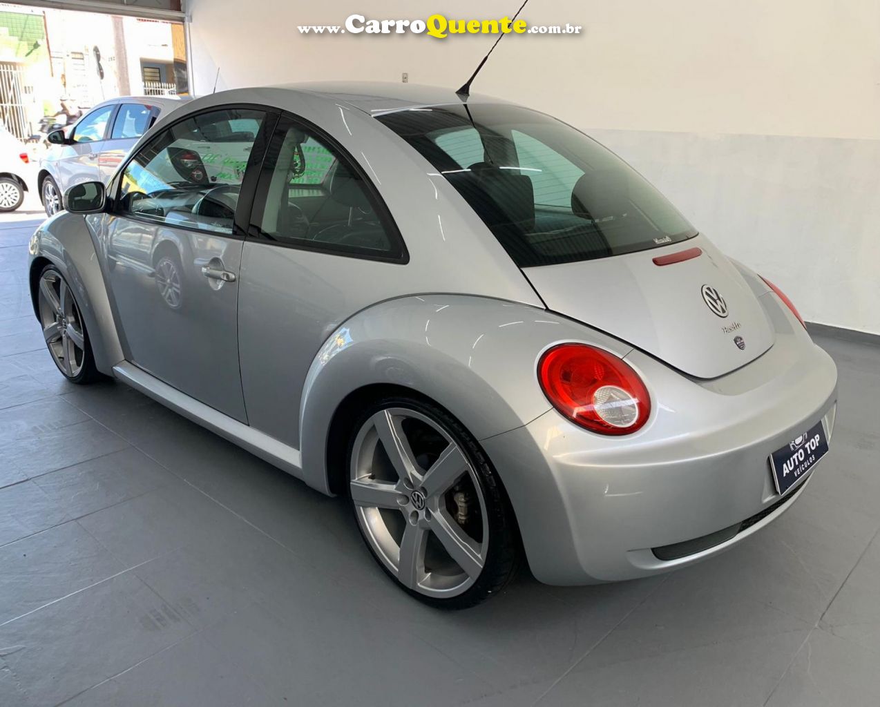 VOLKSWAGEN   NEW BEETLE 2.0 MI MEC.AUT.   PRATA 2007 2.0 GASOLINA - Loja