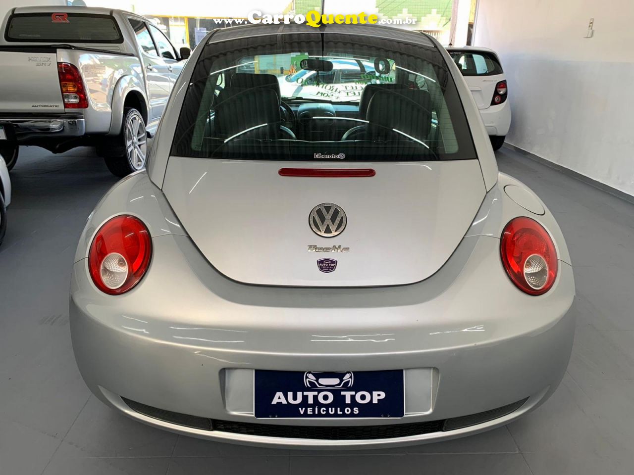 VOLKSWAGEN   NEW BEETLE 2.0 MI MEC.AUT.   PRATA 2007 2.0 GASOLINA - Loja