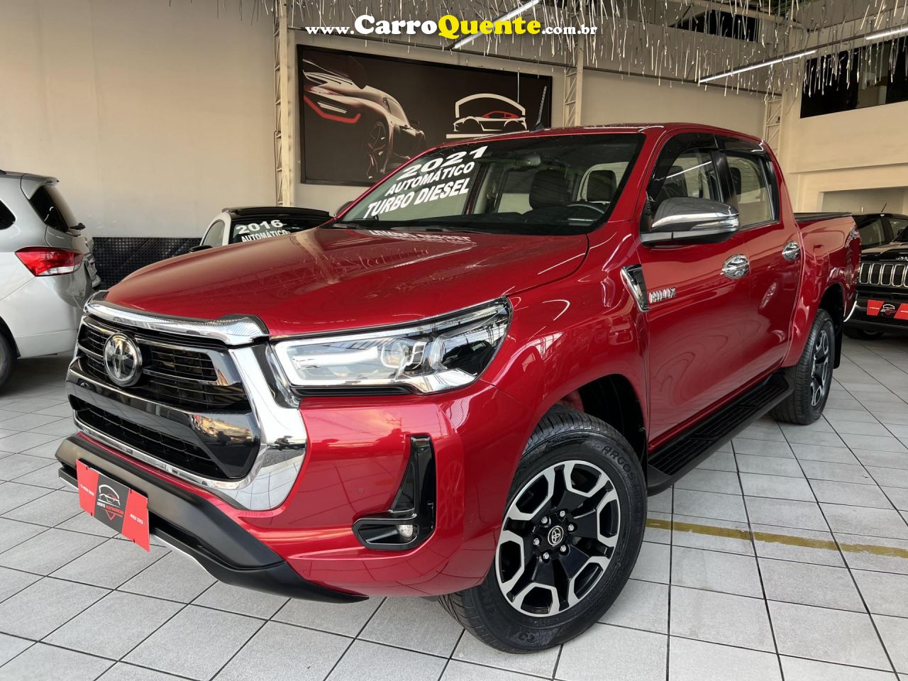 TOYOTA   HILUX CD SRX 4X4 2.8 TDI 16V DIESEL AUT.   VERMELHO 2021 2.8 DIESEL - Loja