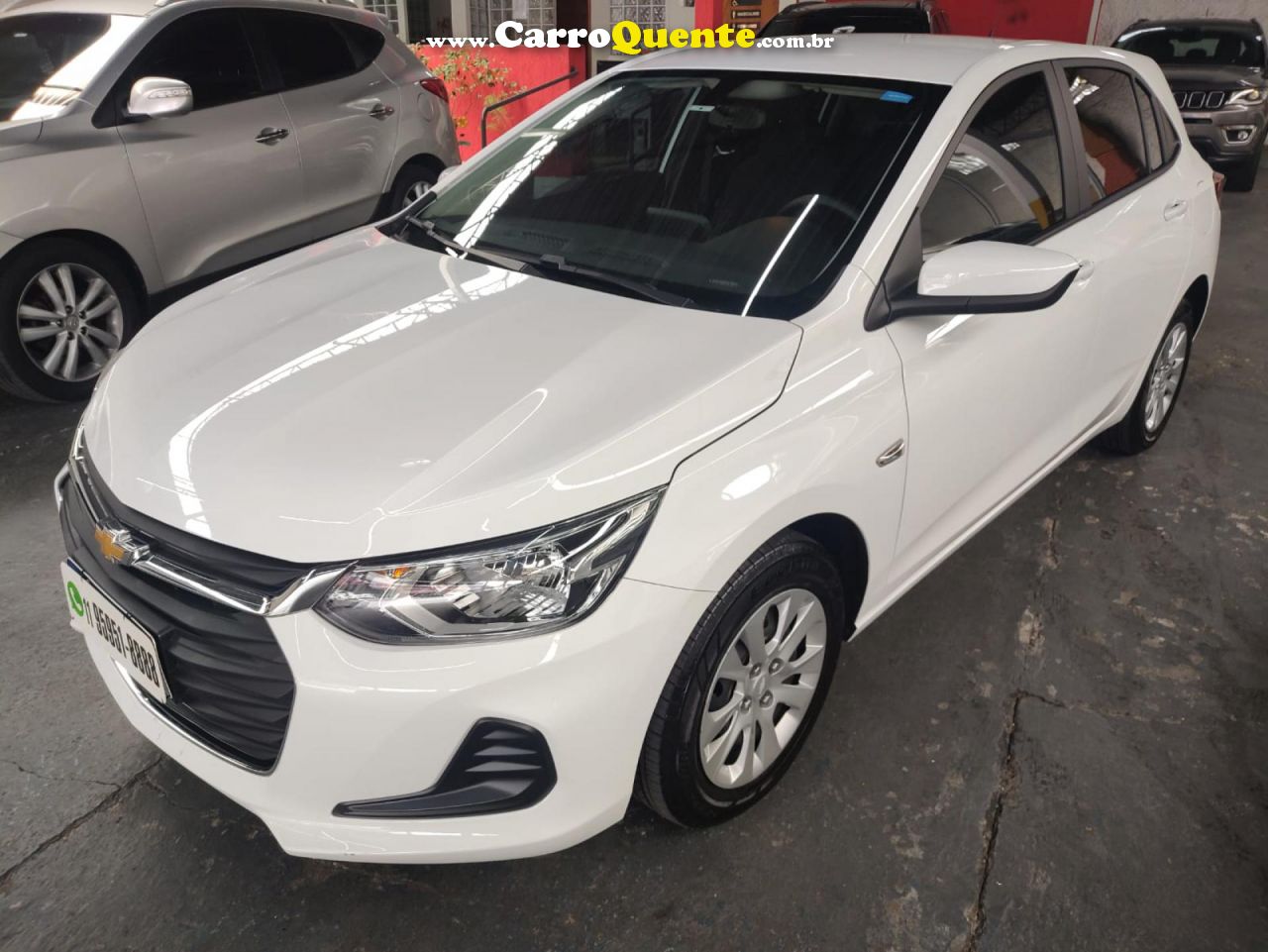 CHEVROLET   ONIX HATCH LT 1.0 12V FLEX 5P MEC.   BRANCO 2023 1.0 FLEX - Loja