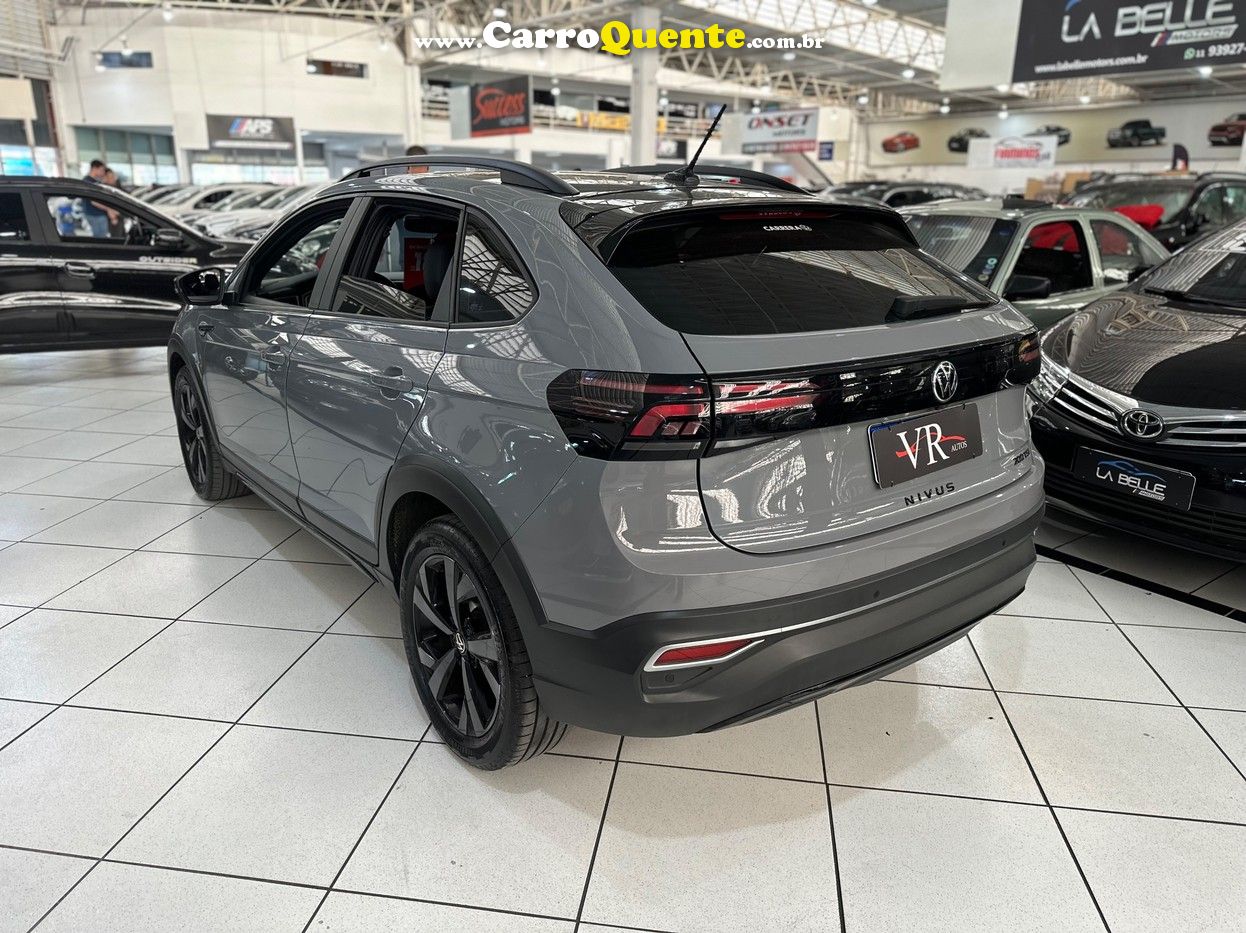 VOLKSWAGEN NIVUS 1.0 200 TSI HIGHLINE 2022 NOVO KM 30.000 - Loja