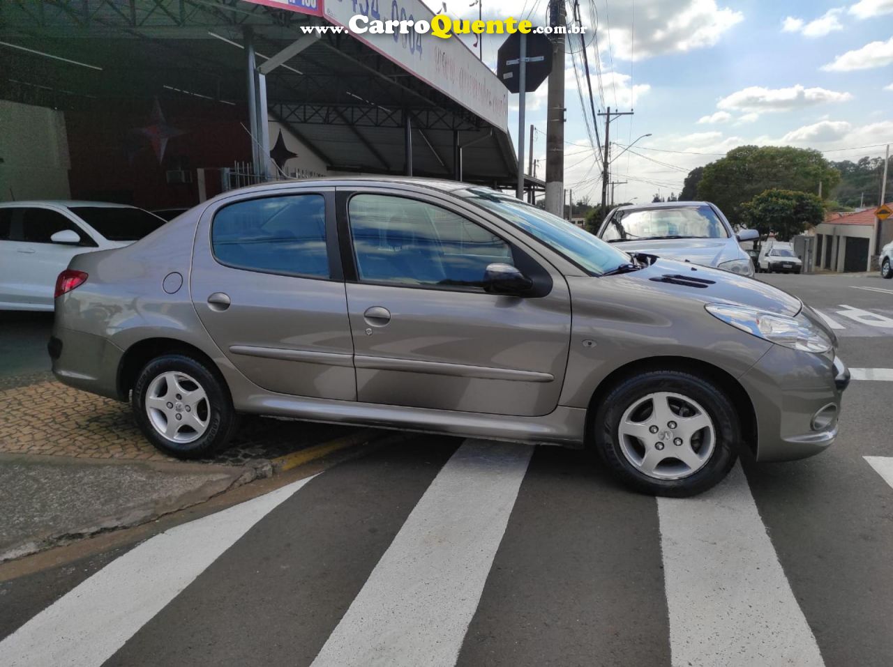 PEUGEOT   207 SED. PASSION XR SPORT 1.4 FLEX 8V 4P   CINZA 2009 1.4 FLEX - Loja