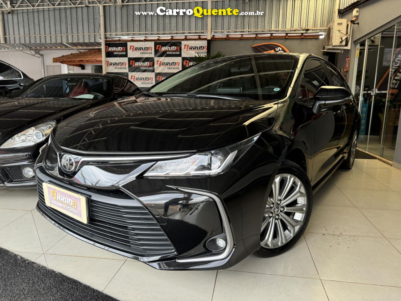 TOYOTA   COROLLA XEI 2.0 FLEX 16V AUT.   PRETO 2023 2.0 FLEX - Loja