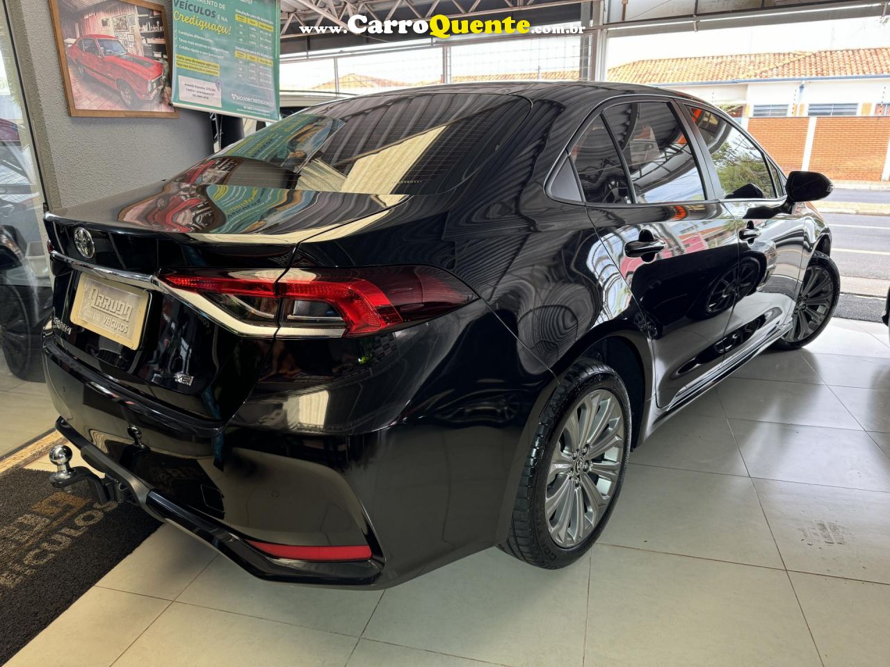 TOYOTA   COROLLA XEI 2.0 FLEX 16V AUT.   PRETO 2023 2.0 FLEX - Loja