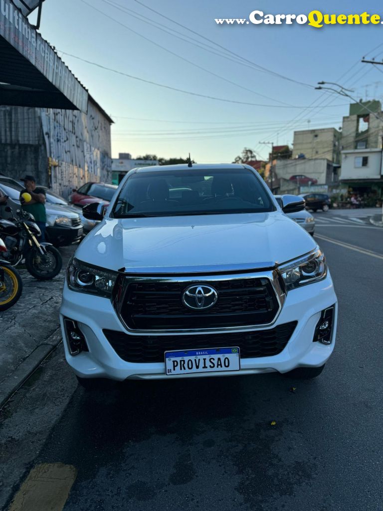 TOYOTA   HILUX CD SRX 4X4 2.8 TDI 16V DIESEL AUT.   BRANCO 2019 2.8 DIESEL - Loja