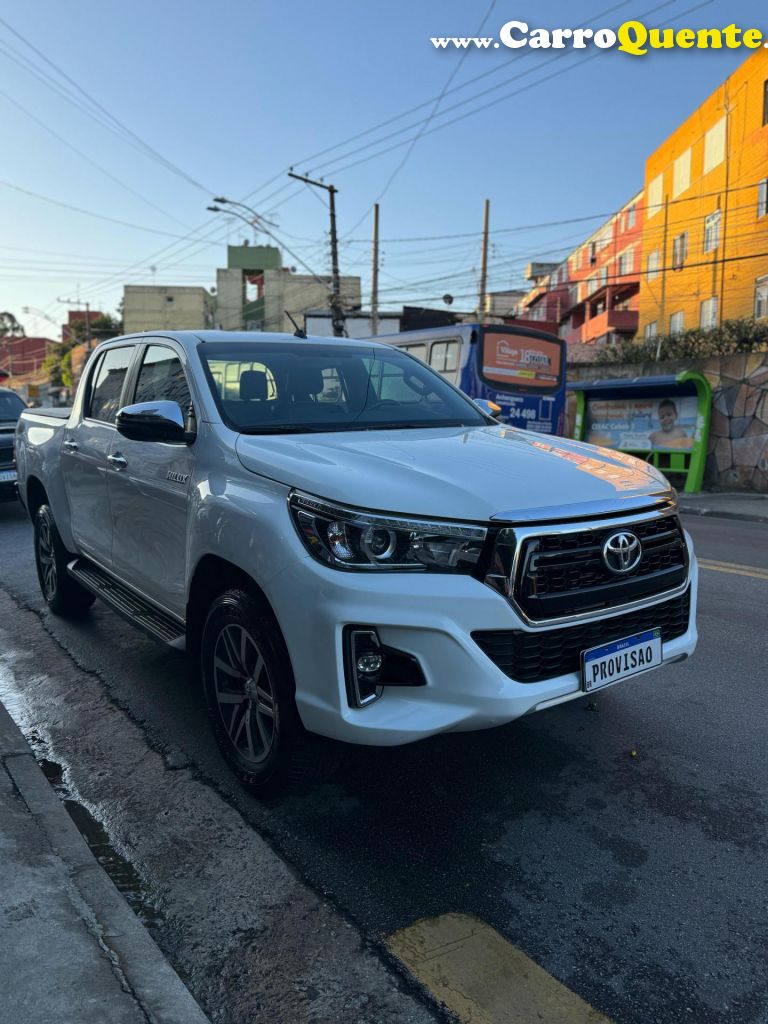 TOYOTA   HILUX CD SRX 4X4 2.8 TDI 16V DIESEL AUT.   BRANCO 2019 2.8 DIESEL - Loja