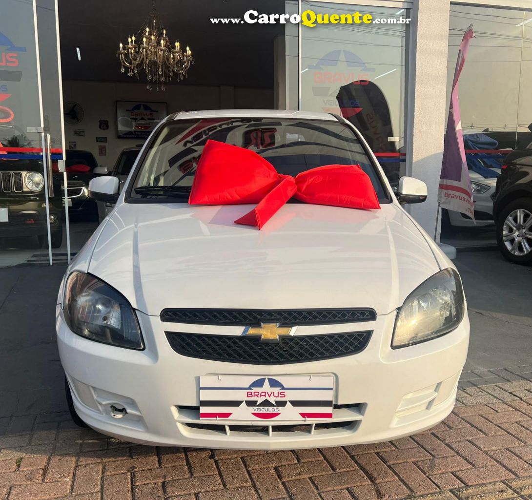 CHEVROLET   CELTA SPIRIT LT 1.0 MPFI 8V FLEXP. 5P   BRANCO 2013 1.0 FLEX - Loja