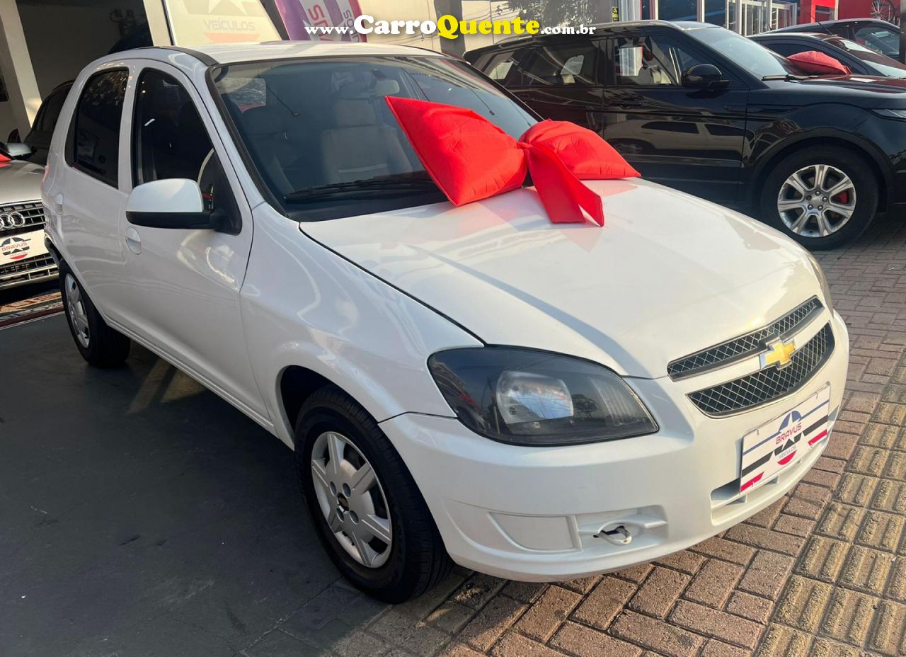 CHEVROLET   CELTA SPIRIT LT 1.0 MPFI 8V FLEXP. 5P   BRANCO 2013 1.0 FLEX - Loja