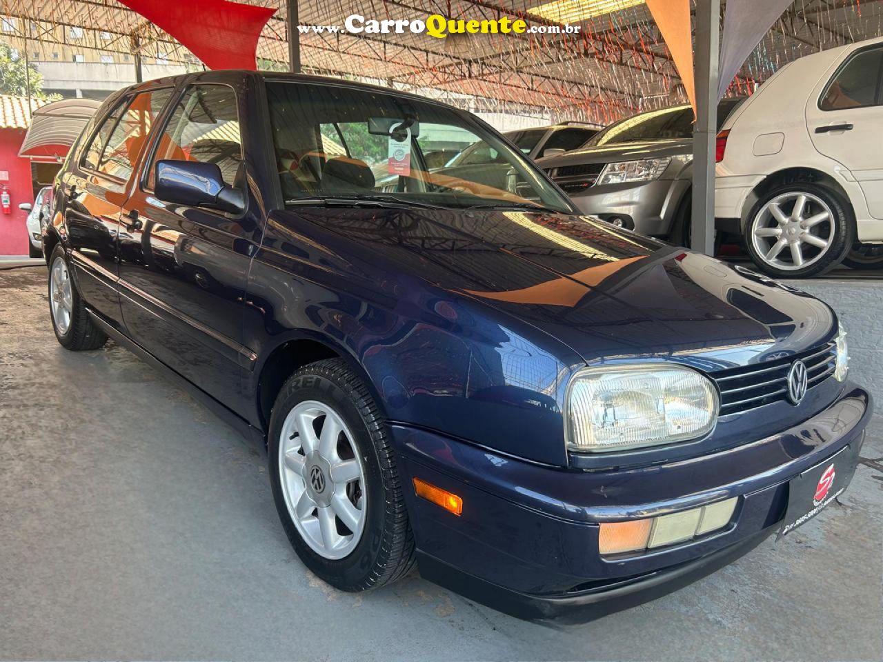 VOLKSWAGEN   GOLF GLX 2.0 4P   AZUL 1998 2.0 GASOLINA - Loja