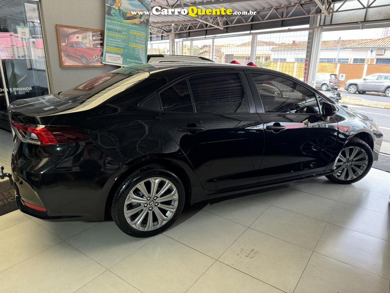 TOYOTA   COROLLA XEI 2.0 FLEX 16V AUT.   PRETO 2023 2.0 FLEX - Loja