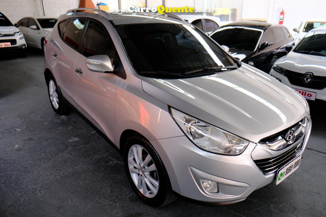 HYUNDAI   IX35 2.0 16V 170CV 2WD4WD AUT.   PRATA 2011 2.0 GASOLINA - Loja