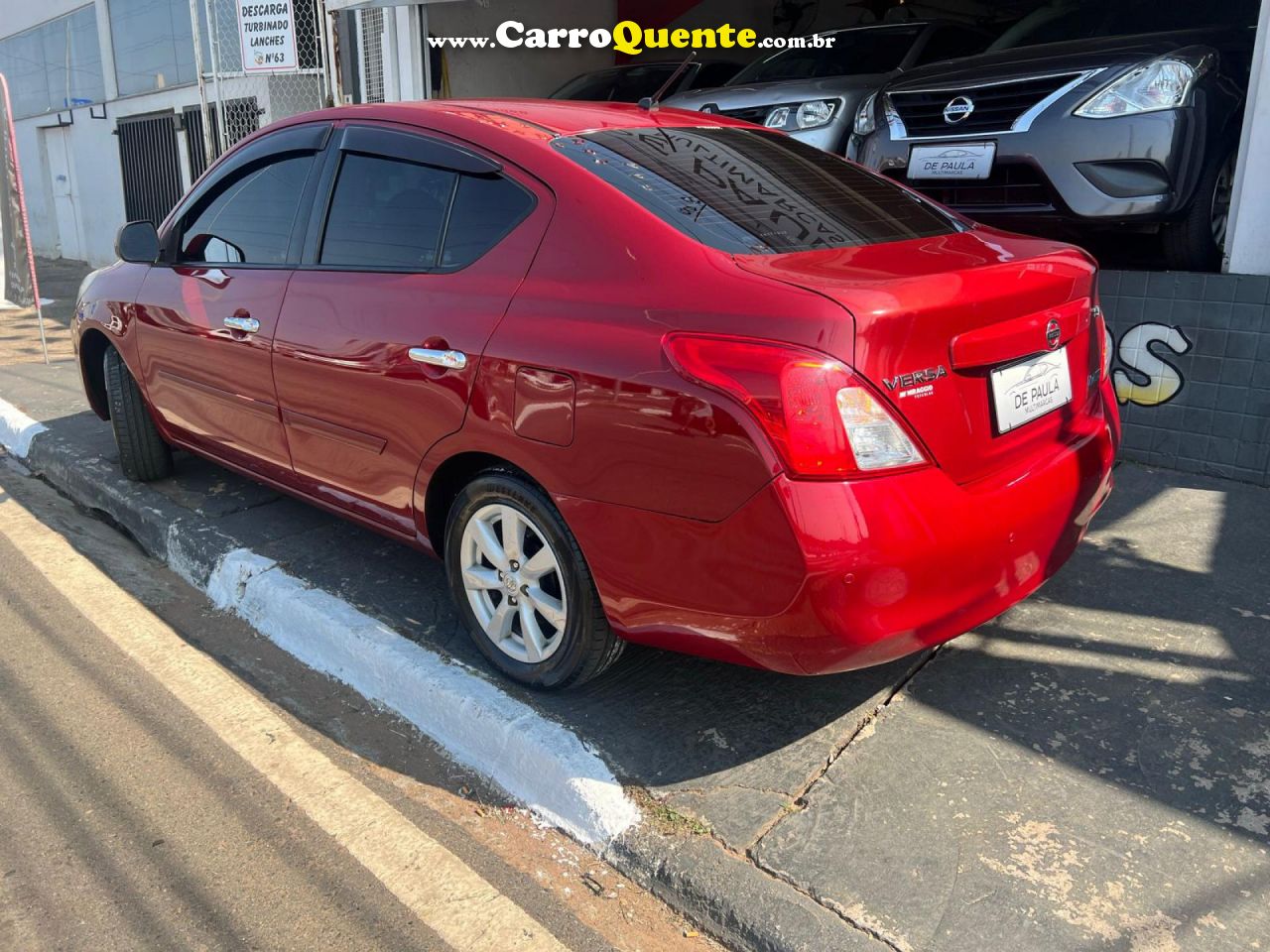 NISSAN   VERSA SL 1.6 16V FLEX FUEL 4P MEC.   VERMELHO 2014 1.6 FLEX - Loja