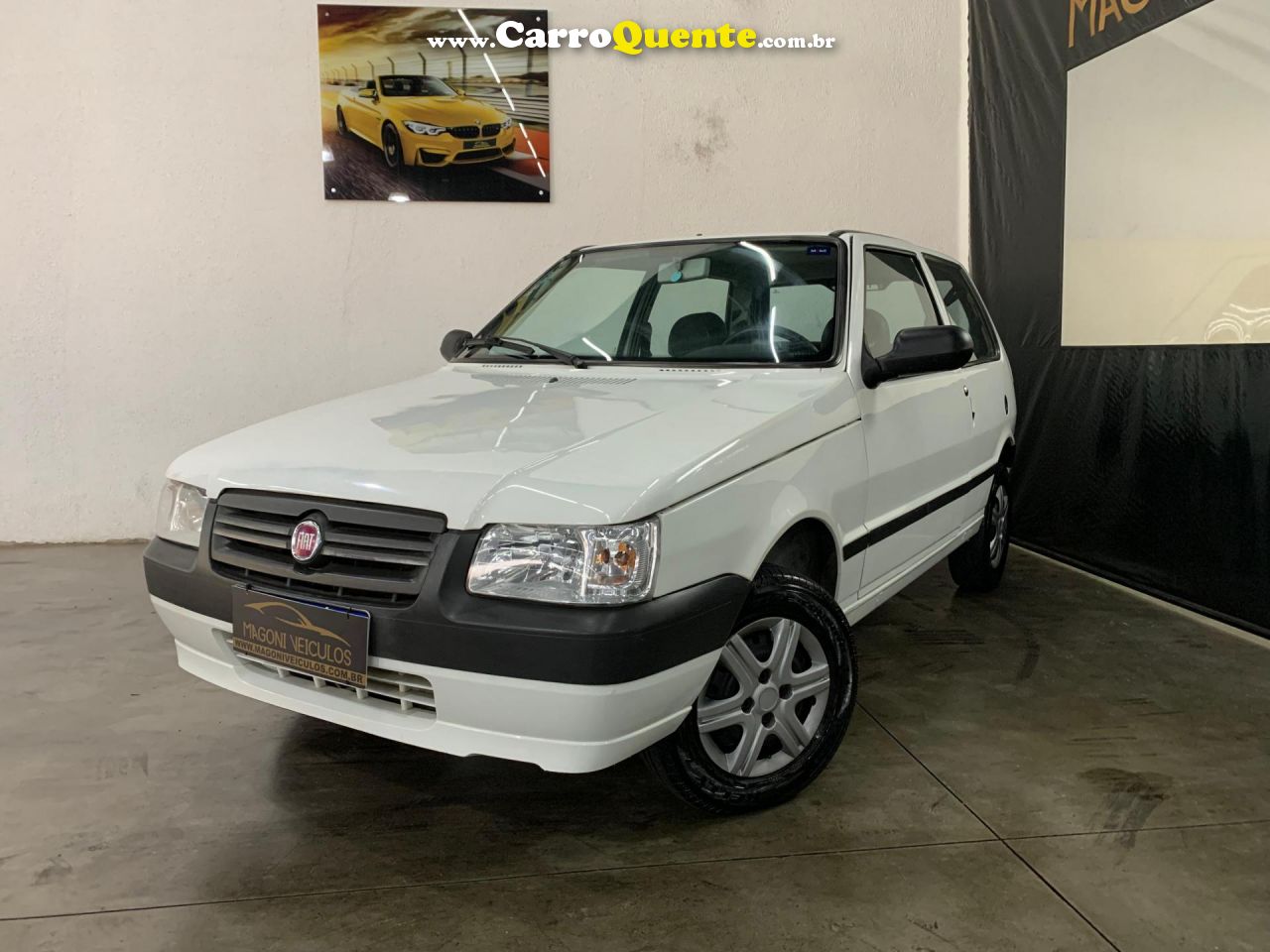 FIAT   UNO MILLE WAY ECONOMY 1.0 F.FLEX 4P   BRANCO 2013 1.0 GASOLINA - Loja