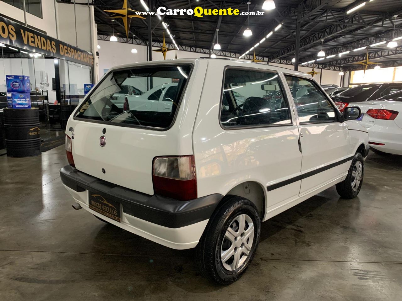 FIAT   UNO MILLE WAY ECONOMY 1.0 F.FLEX 4P   BRANCO 2013 1.0 GASOLINA - Loja