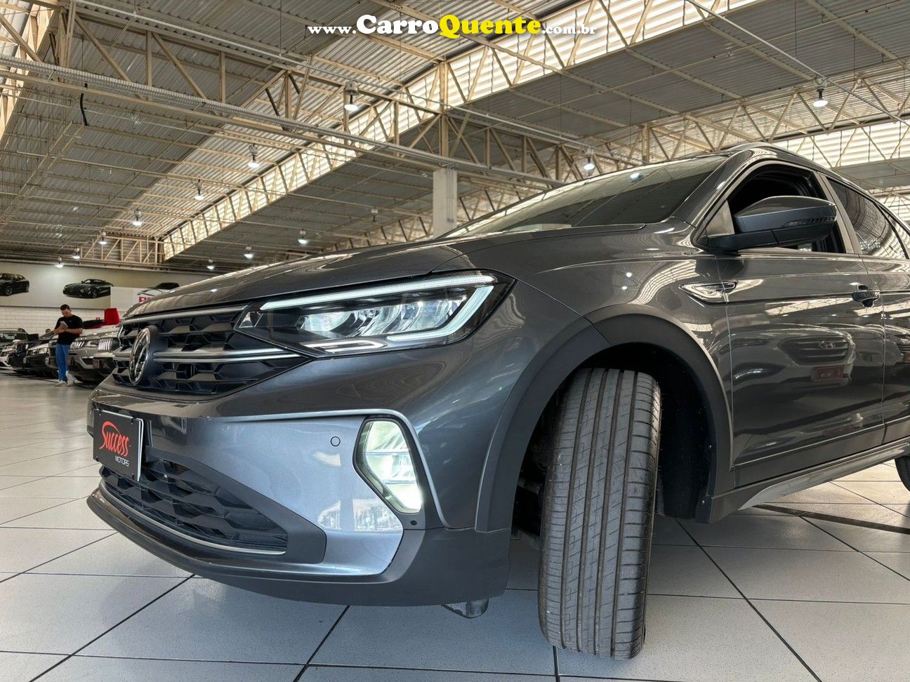 VOLKSWAGEN NIVUS 1.0 200 TSI HIGHLINE - Loja