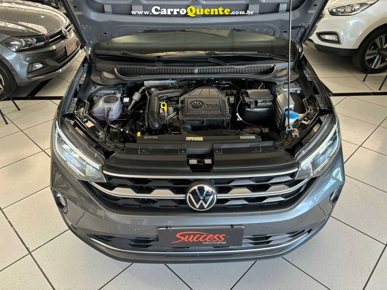 VOLKSWAGEN NIVUS 1.0 200 TSI HIGHLINE - Loja