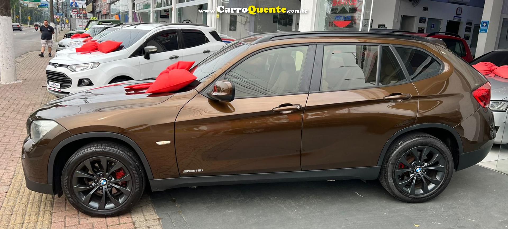 BMW   X1 SDRIVE 18I 2.0 16V 4X2 AUT.   MARROM 2011 2.0 GASOLINA - Loja