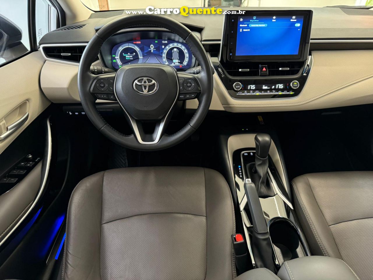 TOYOTA   COROLLA ALTIS PREM. 1.8 AUT. (HÍBRIDO)   BRANCO 2024 1.8 GASOLINA E ELÉTRICO - Loja