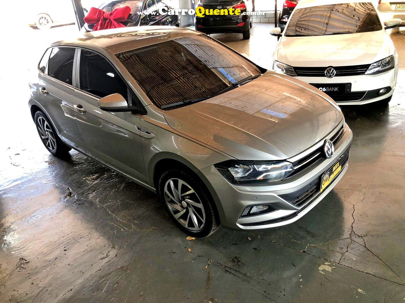 VOLKSWAGEN POLO 1.0 200 TSI HIGHLINE - Loja