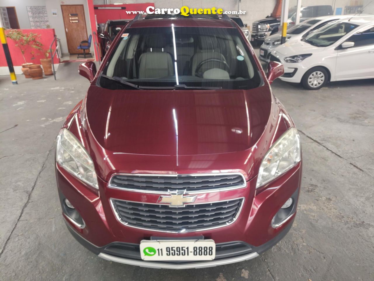 CHEVROLET   TRACKER LTZ 1.8 16V FLEX 4X2 AUT.   VERMELHO 2014 1.8 FLEX - Loja