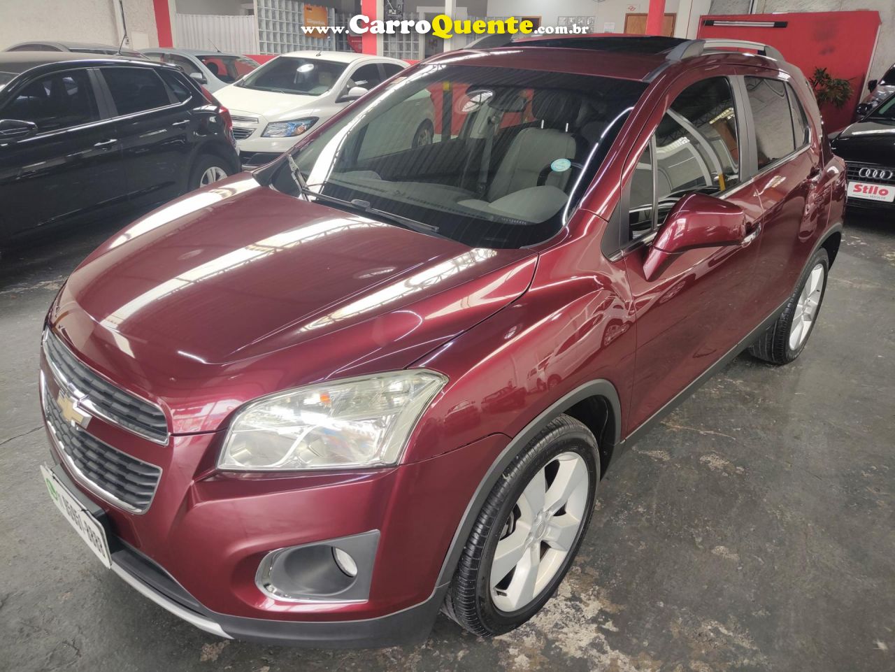 CHEVROLET   TRACKER LTZ 1.8 16V FLEX 4X2 AUT.   VERMELHO 2014 1.8 FLEX - Loja