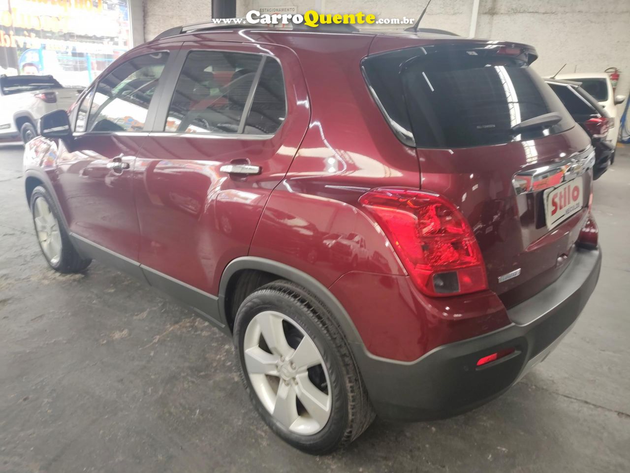 CHEVROLET   TRACKER LTZ 1.8 16V FLEX 4X2 AUT.   VERMELHO 2014 1.8 FLEX - Loja