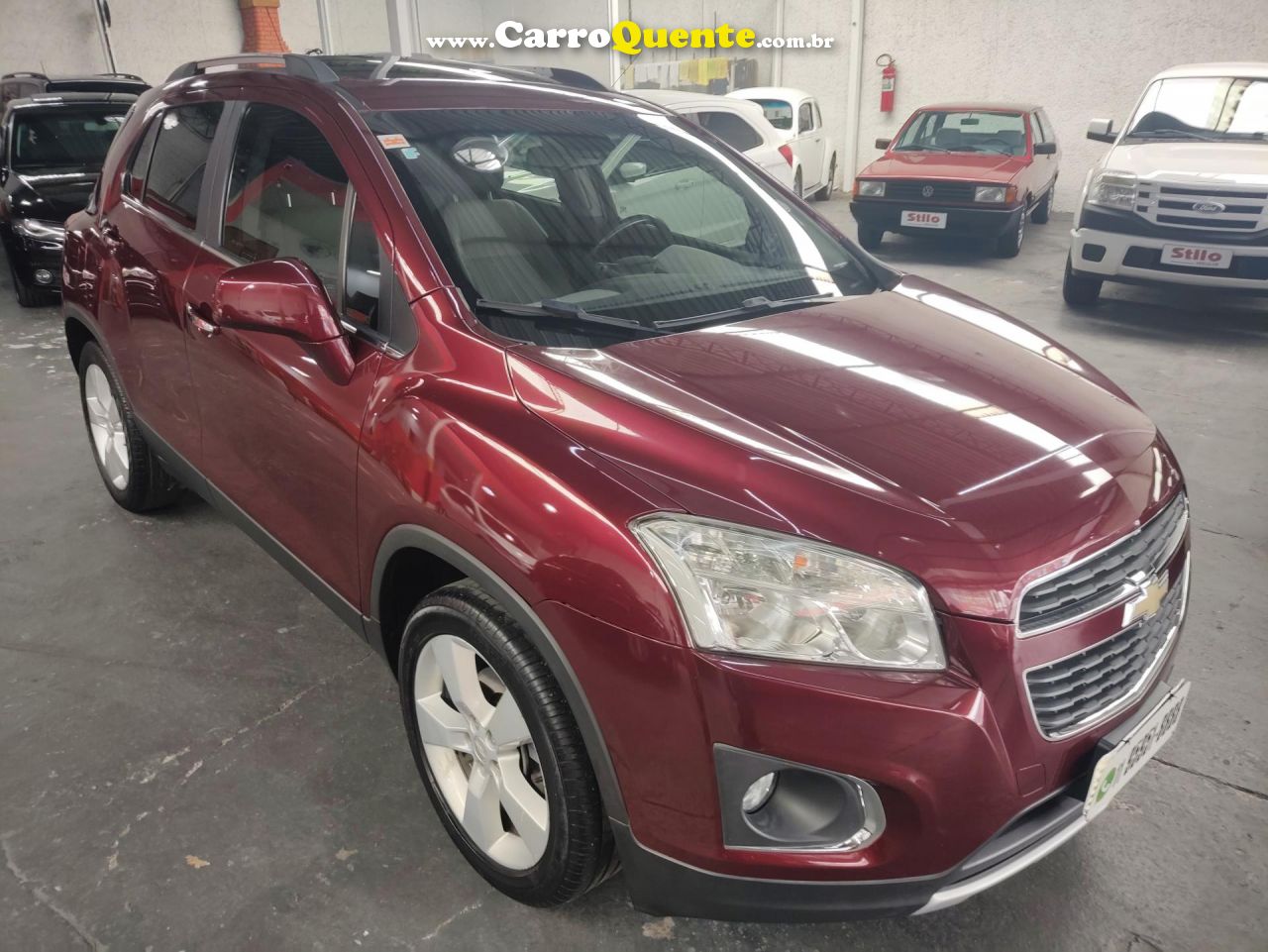 CHEVROLET   TRACKER LTZ 1.8 16V FLEX 4X2 AUT.   VERMELHO 2014 1.8 FLEX - Loja