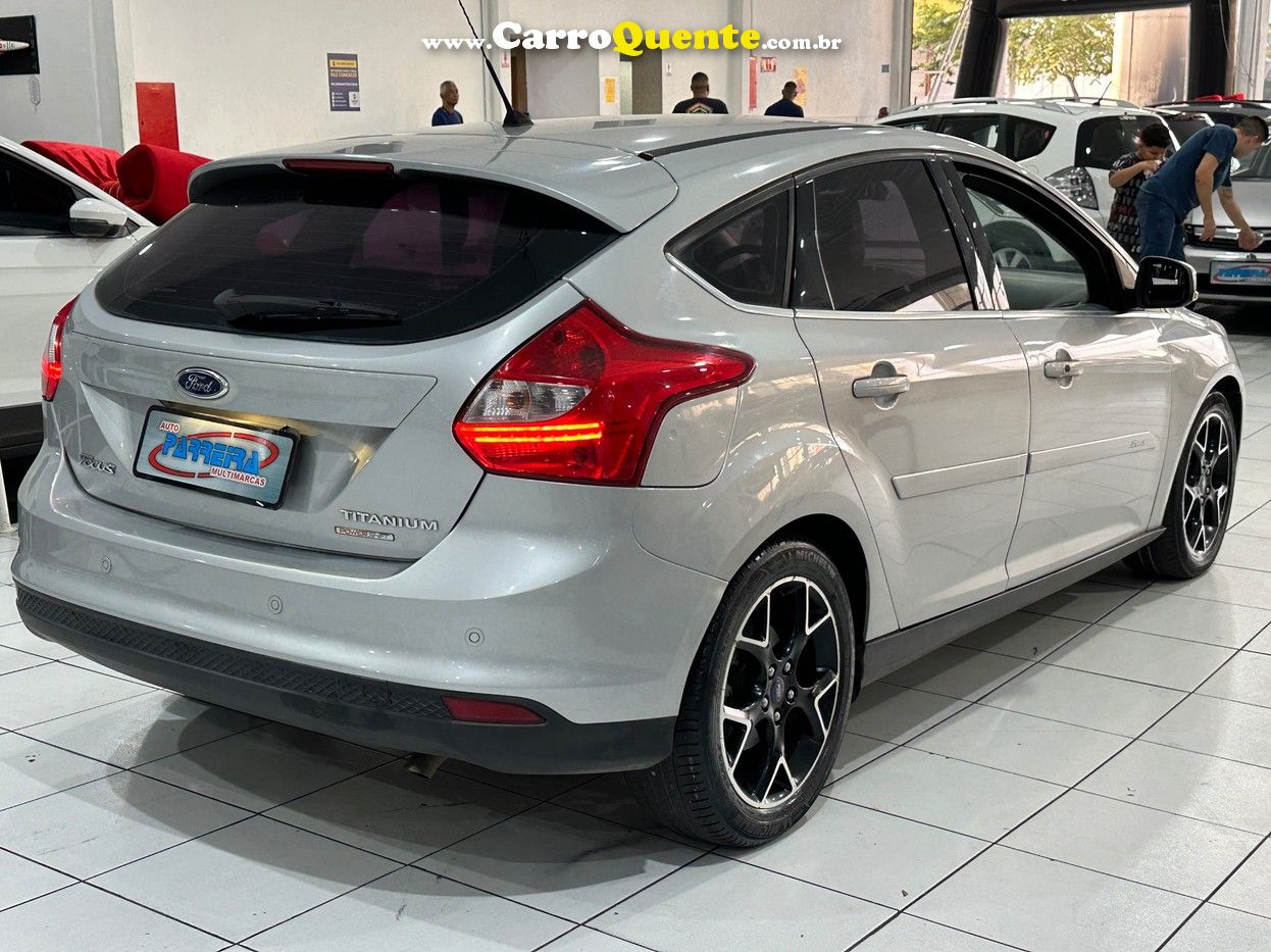 FORD FOCUS 2.0 TITANIUM PLUS HATCH 16V - Loja