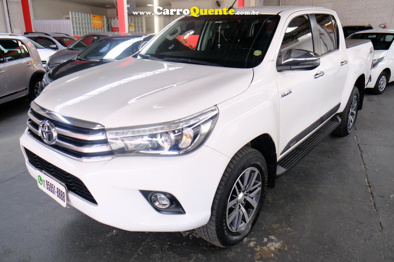 TOYOTA   HILUX CD SRX 4X4 2.8 TDI 16V DIESEL AUT.   BRANCO 2018 2.8 DIESEL - Loja