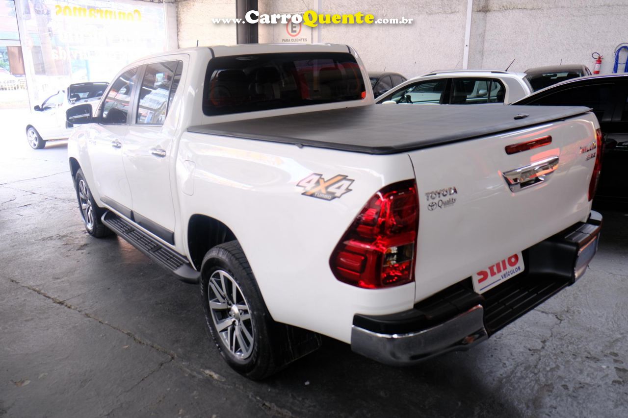 TOYOTA   HILUX CD SRX 4X4 2.8 TDI 16V DIESEL AUT.   BRANCO 2018 2.8 DIESEL - Loja