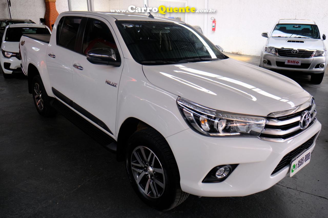 TOYOTA   HILUX CD SRX 4X4 2.8 TDI 16V DIESEL AUT.   BRANCO 2018 2.8 DIESEL - Loja