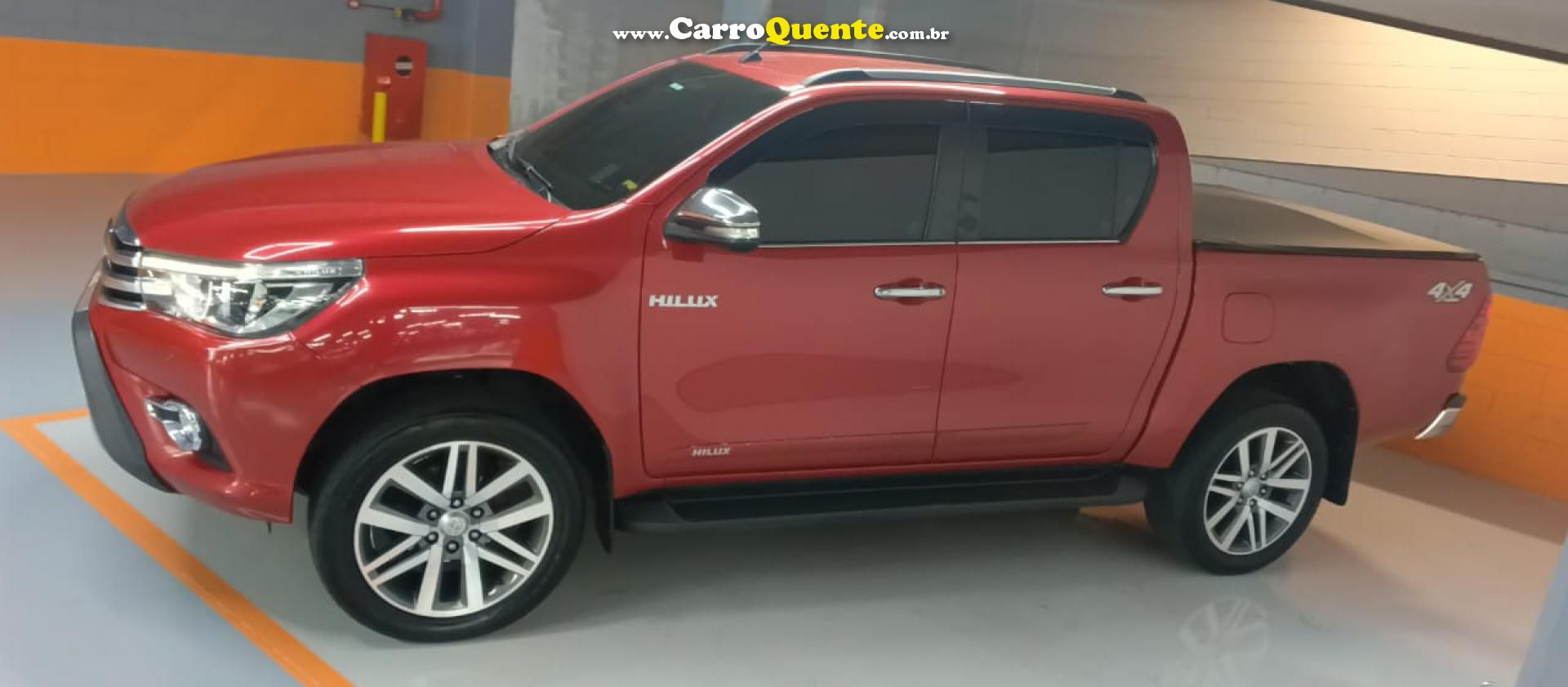 TOYOTA   HILUX CD SRX 4X4 2.8 TDI 16V DIESEL AUT.   VERMELHO 2017 2.8 DIESEL - Loja