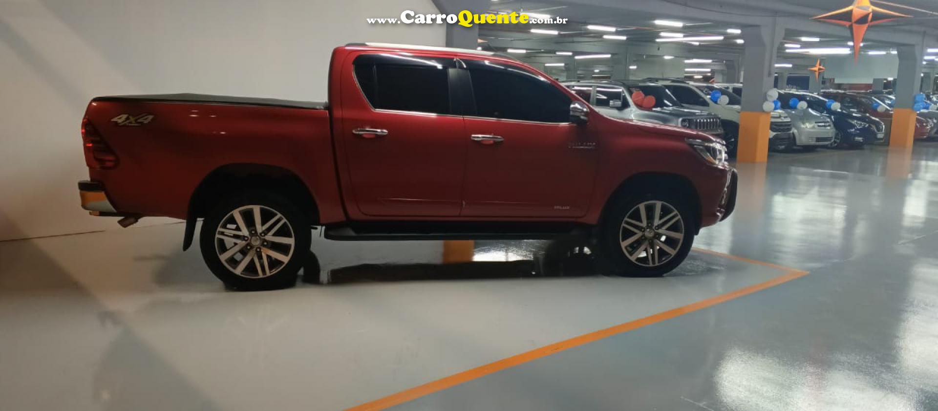 TOYOTA   HILUX CD SRX 4X4 2.8 TDI 16V DIESEL AUT.   VERMELHO 2017 2.8 DIESEL - Loja
