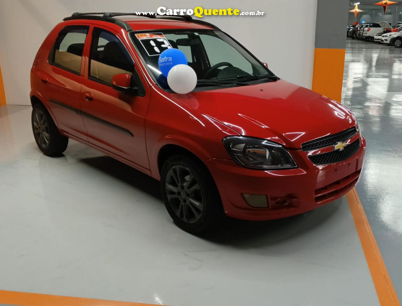 CHEVROLET   CELTA SPIRIT LT 1.0 MPFI 8V FLEXP. 5P   VERMELHO 2013 1.0 FLEX - Loja