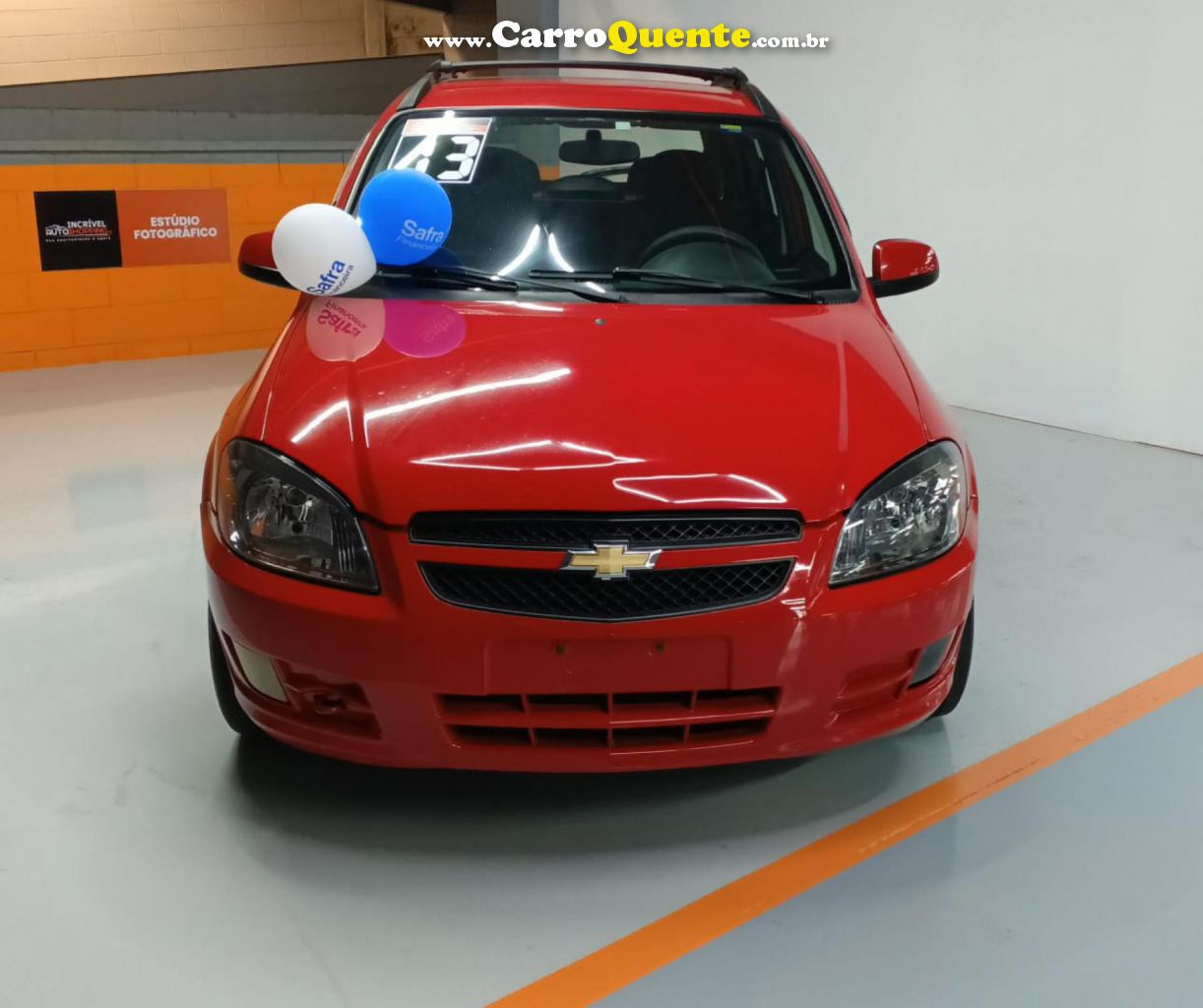 CHEVROLET   CELTA SPIRIT LT 1.0 MPFI 8V FLEXP. 5P   VERMELHO 2013 1.0 FLEX - Loja