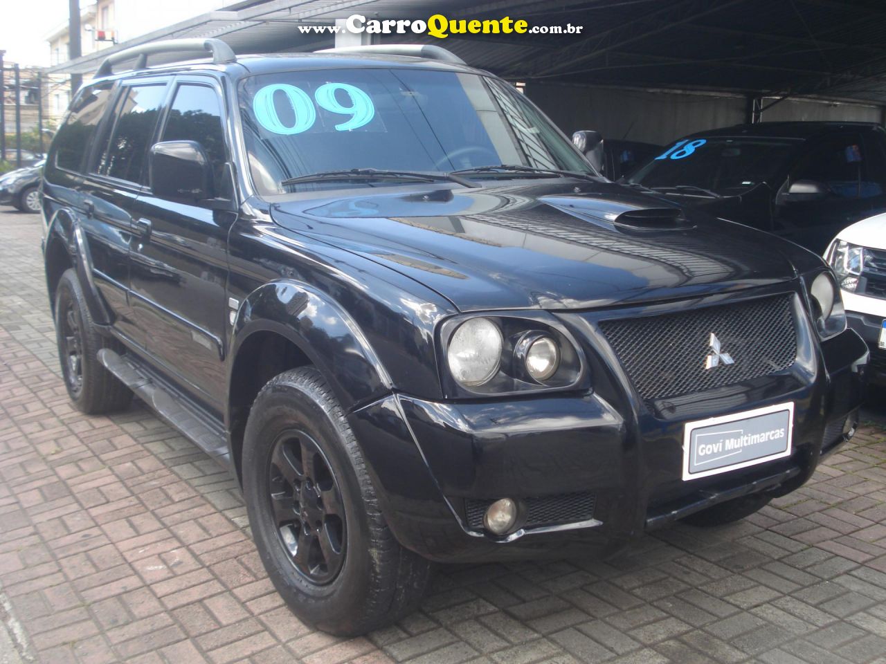 MITSUBISHI   PAJERO SPORT HPE 2.5 4X4 DIESEL MEC.   PRETO 2009 2.5 DIESEL - Loja