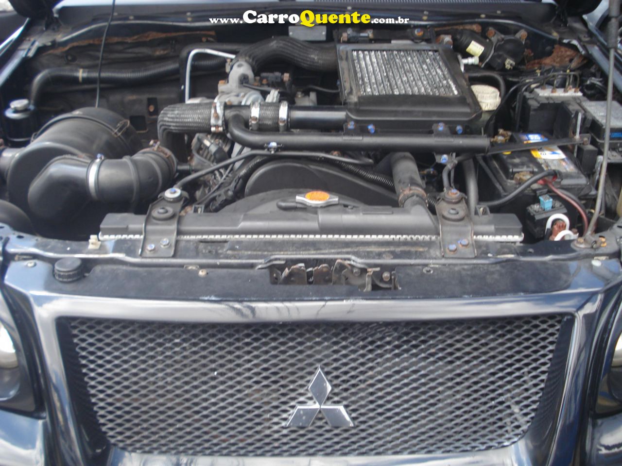 MITSUBISHI   PAJERO SPORT HPE 2.5 4X4 DIESEL MEC.   PRETO 2009 2.5 DIESEL - Loja