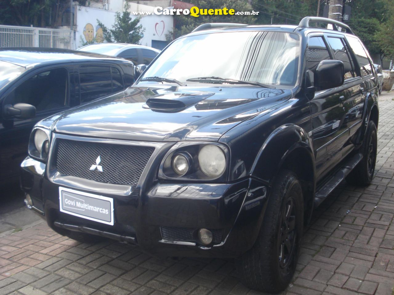 MITSUBISHI   PAJERO SPORT HPE 2.5 4X4 DIESEL MEC.   PRETO 2009 2.5 DIESEL - Loja