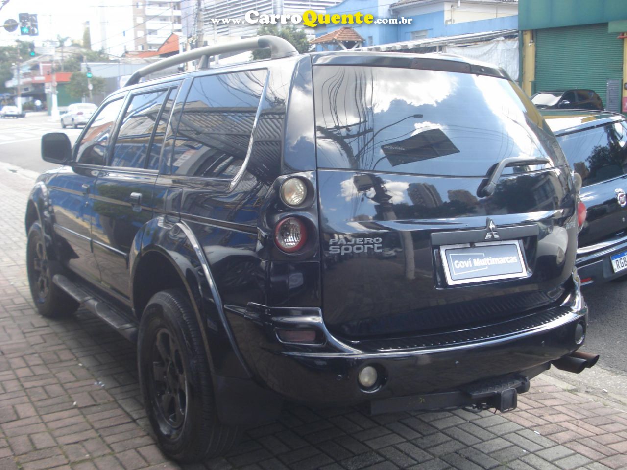 MITSUBISHI   PAJERO SPORT HPE 2.5 4X4 DIESEL MEC.   PRETO 2009 2.5 DIESEL - Loja