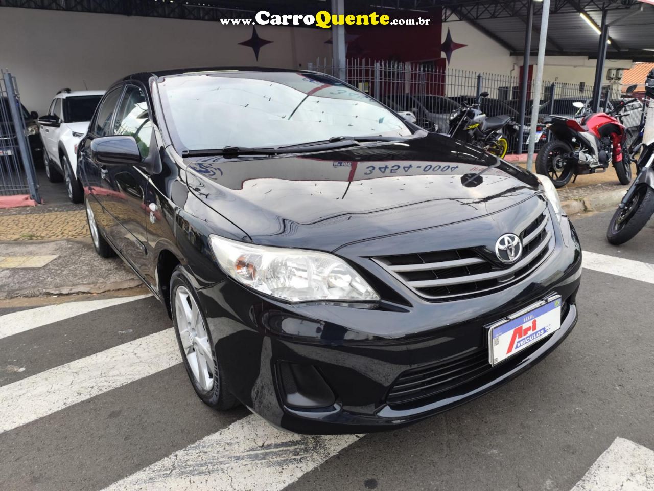 TOYOTA   COROLLA GLI 1.8 FLEX 16V  AUT.   PRETO 2013 1.8 FLEX - Loja